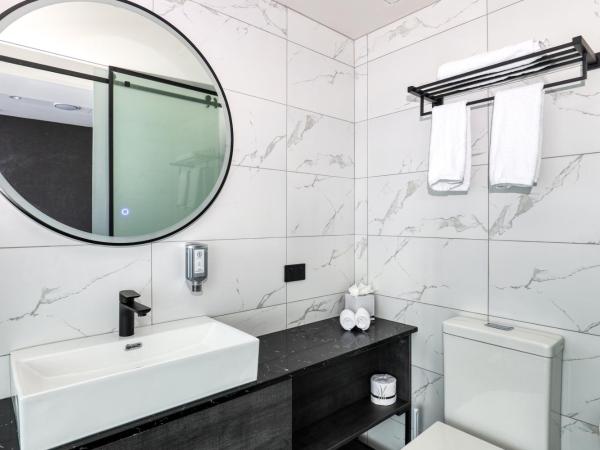 Microtel by Wyndham Wellington : photo 6 de la chambre chambre lit queen-size deluxe 