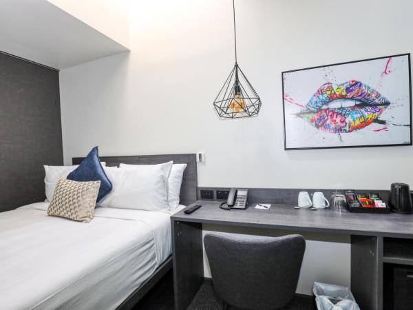 Microtel by Wyndham Wellington : photo 3 de la chambre chambre lit queen-size 