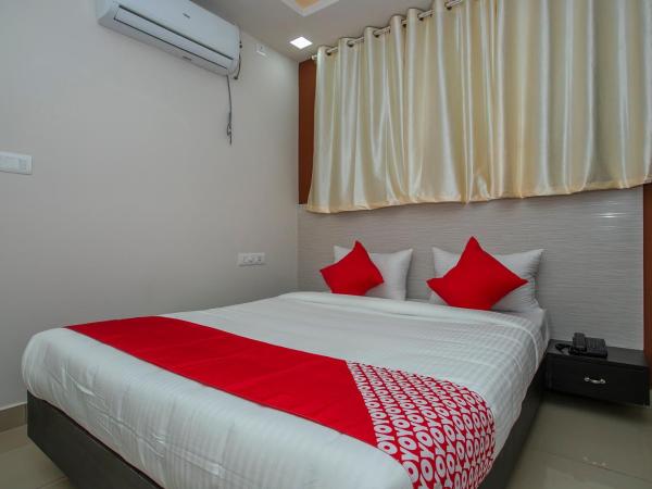 Hotel O Varcity Phi Premium Pavilion ,Above HDFC Bank ,Near Anjaneya Temple Madiwala, Hosur Main r : photo 1 de la chambre chambre double standard