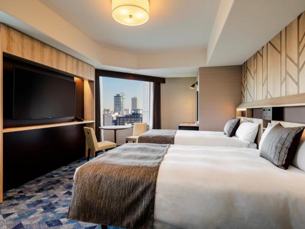 Hotel Monterey Edelhof Sapporo : photo 1 de la chambre south corner twin room (2nd - 12th floor)  - non-smoking