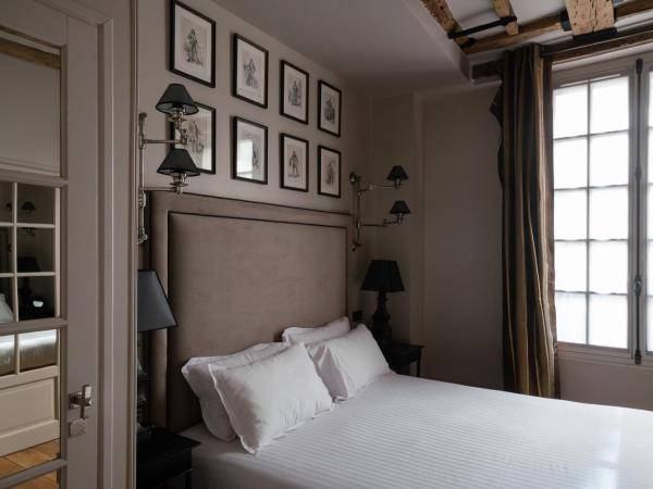 Hotel Saint-Louis en L'Isle - Notre-Dame : photo 4 de la chambre chambre deluxe double ou lits jumeaux