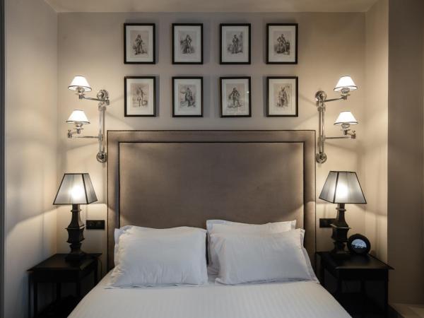 Hotel Saint-Louis en L'Isle - Notre-Dame : photo 3 de la chambre chambre deluxe double ou lits jumeaux