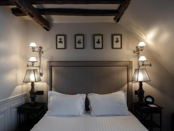 Hotel Saint-Louis en L'Isle - Notre-Dame : photo 6 de la chambre chambre double ou lits jumeaux de luxe - dernier Étage