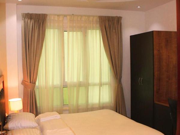 ريلاكس ان للشقق الفندقية relax inn : photo 3 de la chambre chambre deluxe (2 adultes + 1 enfant)