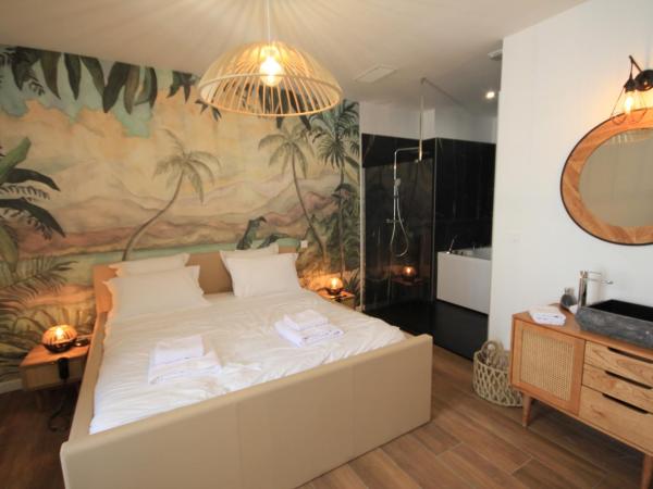 La Maison de l'Olivier : photo 3 de la chambre appartement supérieur