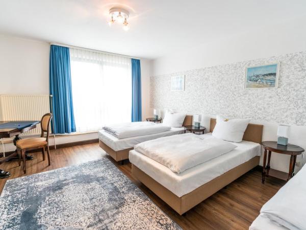 Hotel Am Kamp : photo 3 de la chambre chambre triple