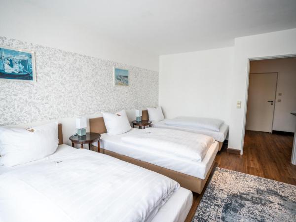 Hotel Am Kamp : photo 2 de la chambre chambre triple