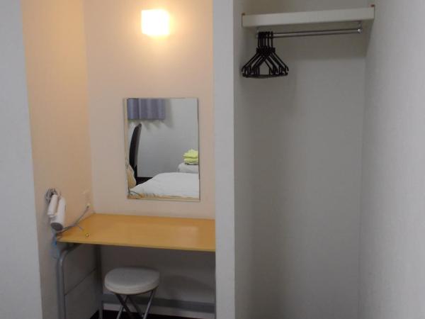 Hotel Chuo Oasis : photo 3 de la chambre chambre lits jumeaux