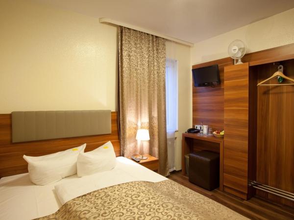 Hotel Frankfurt Messe : photo 1 de la chambre chambre simple avec salle de bains privative