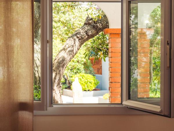 Le Lido : photo 9 de la chambre chambre double - vue sur jardin