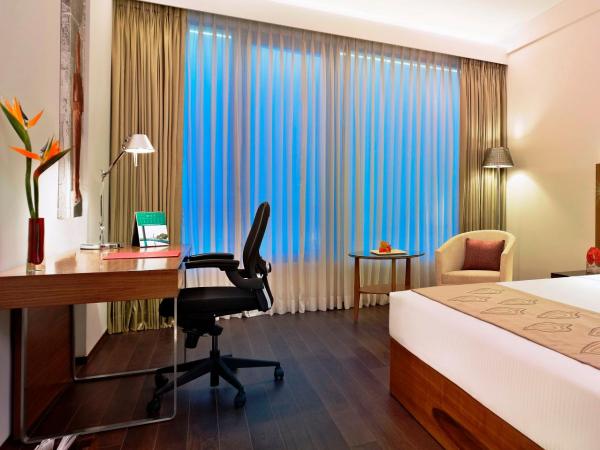 Vivanta Chennai IT Expressway OMR : photo 2 de la chambre executive room pool view twin bed with 25% off on food & soft beverages