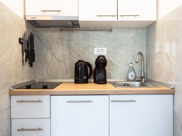 Orsan Residence : photo 9 de la chambre studio lit queen-size