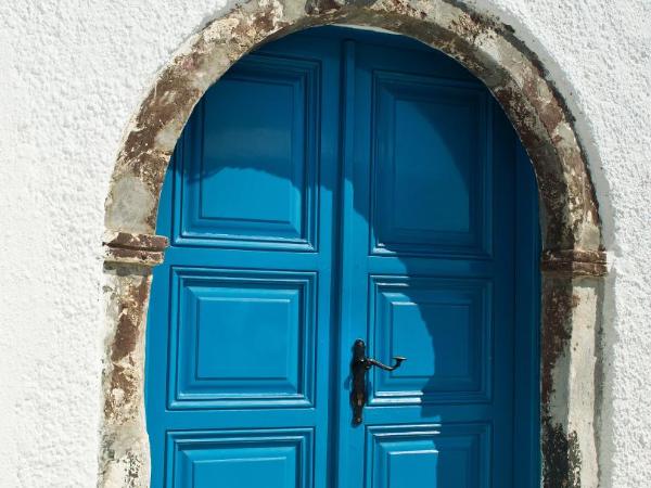 Nikos Villas : photo 6 de la chambre appartement supérieur avec vue sur la caldeira