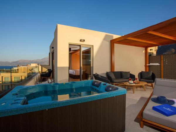 Palmera Beach Hotel & Spa - Adults Only : photo 6 de la chambre suite supérieure deluxe avec jacuzzi - vue sur mer