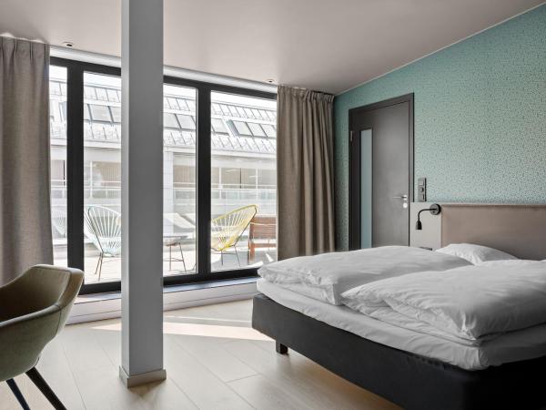 Comfort Hotel Xpress Central Station : photo 6 de la chambre chambre double avec balcon