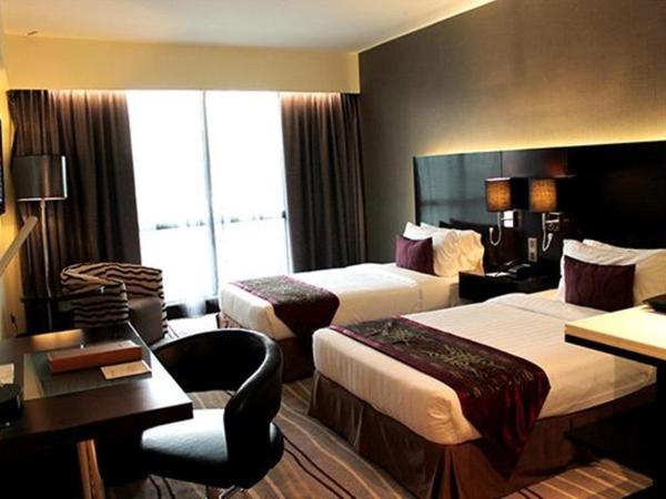 Ming Garden Hotel & Residences : photo 1 de la chambre chambre deluxe double ou lits jumeaux