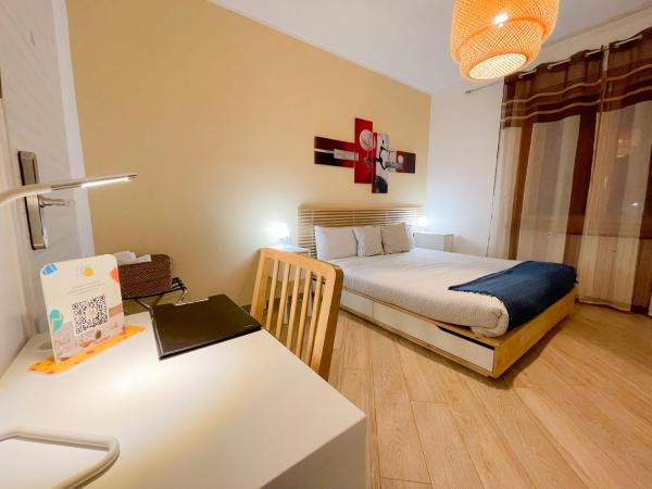 MilanHolidays : photo 4 de la chambre chambre double ou lits jumeaux avec salle de bains privative externe