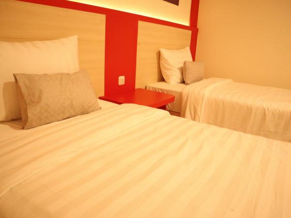 D'Carol Hotel : photo 2 de la chambre chambre lits jumeaux supérieure - sans fenêtre