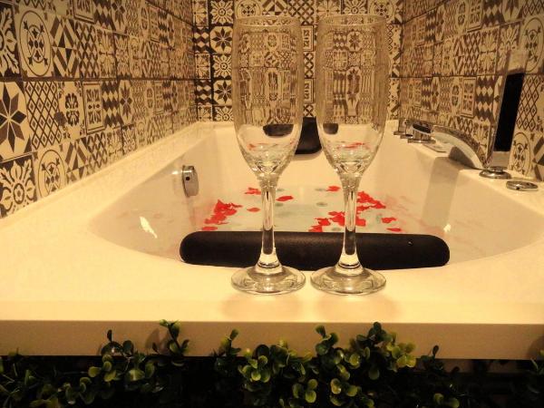 Cozy Rooms - BAÑERA HIDROMASAJE : photo 1 de la chambre suite avec jacuzzi