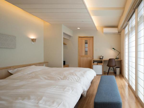 Arima Koyado Uraku : photo 1 de la chambre chambre lits jumeaux avec douche