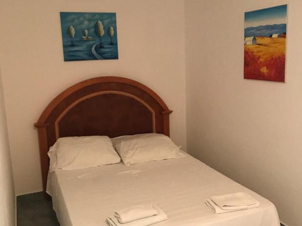 Rooms Laura : photo 9 de la chambre chambre familiale