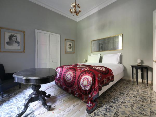 Mimi Calpe : photo 1 de la chambre suite jardin