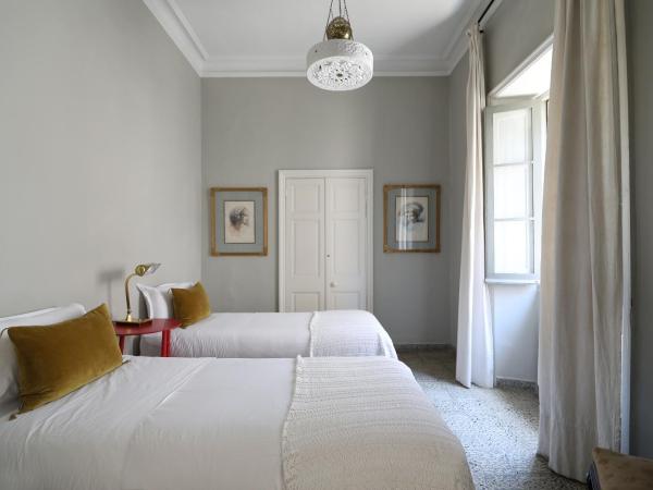 Mimi Calpe : photo 3 de la chambre suite jardin