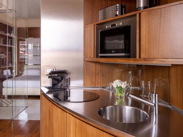 Repubblica Firenze Luxury Apartments | UNA Esperienze : photo 8 de la chambre hébergement décloisonné avec terrasse privée - vue panoramique