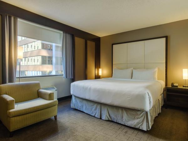 Arc The Hotel : photo 1 de la chambre luxueuse suite lit king-size romantique