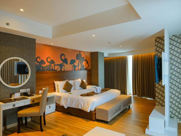 Platinum Adisucipto Hotel & Conference Center : photo 1 de la chambre chambre double exécutive