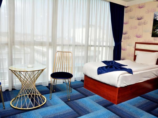 Business Grand Hotel : photo 9 de la chambre chambre lits jumeaux