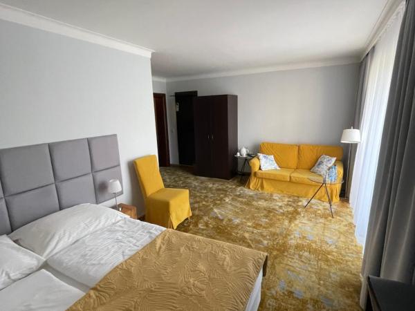 Willa 4 Pory Roku & Uznam : photo 5 de la chambre chambre double deluxe avec balcon