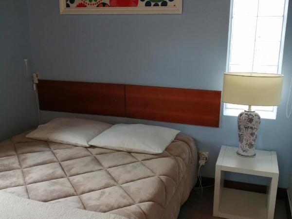 Peniche Blue Wave Home : photo 2 de la chambre chambre familiale