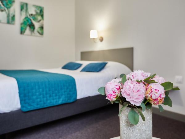 Hotel De La Pommeraie : photo 1 de la chambre chambre double