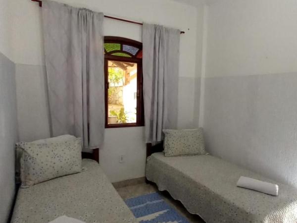 Pousada Recanto Das Emerências : photo 8 de la chambre maison de ville 2 chambres