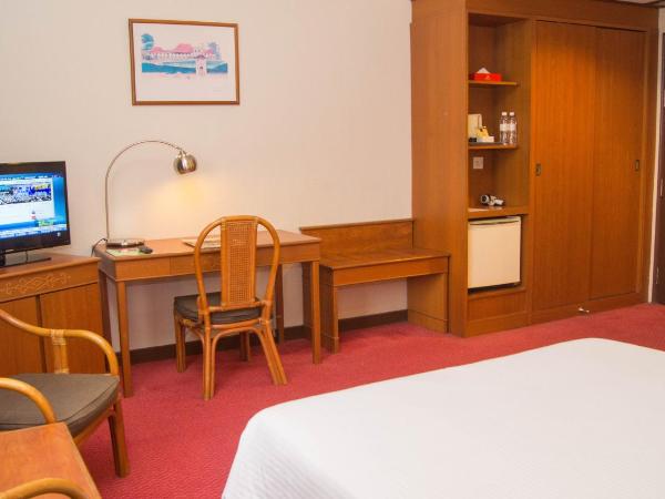 Hotel Grand Continental Kuching : photo 2 de la chambre chambre standard lit queen-size