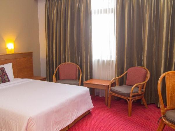 Hotel Grand Continental Kuching : photo 1 de la chambre chambre standard lit queen-size