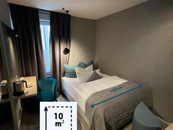 Hotel Falkenturm : photo 1 de la chambre chambre lit queen-size