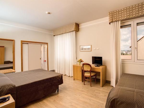 Hotel Delle Nazioni : photo 4 de la chambre chambre triple