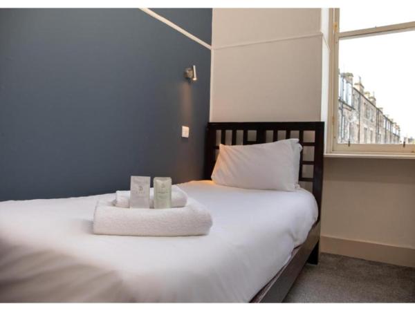 JOIVY Haymarket : photo 1 de la chambre chambre simple