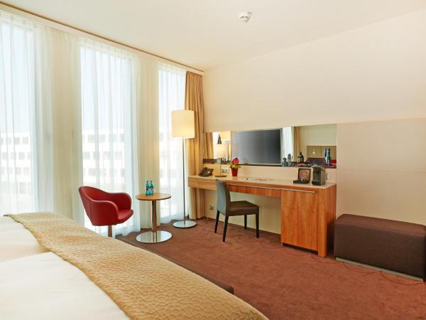 H4 Hotel München Messe : photo 5 de la chambre chambre double ou lits jumeaux supérieure