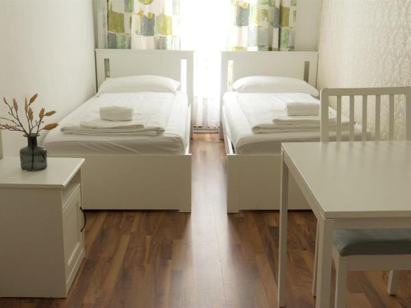 Hotel Pension ARPI : photo 1 de la chambre chambre lits jumeaux