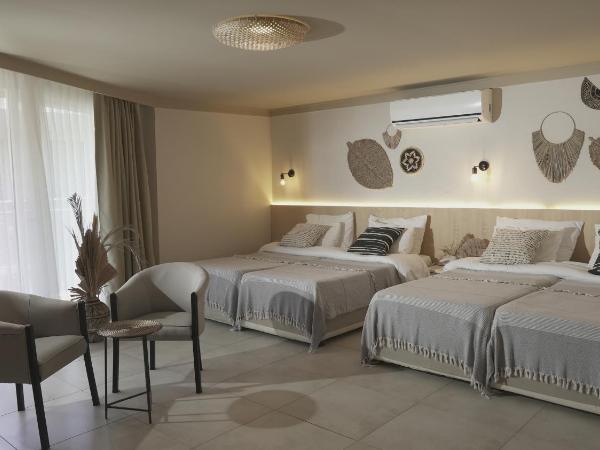 Sun Hotel By En Vie Beach : photo 3 de la chambre chambre quadruple