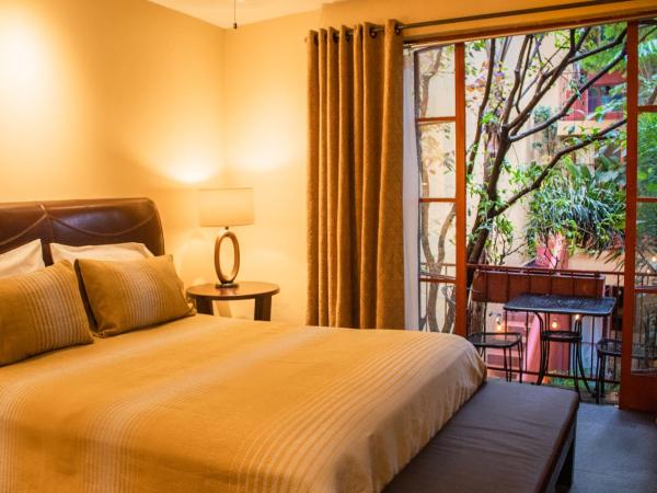 The Red Tree House : photo 9 de la chambre chambre double - vue sur jardin