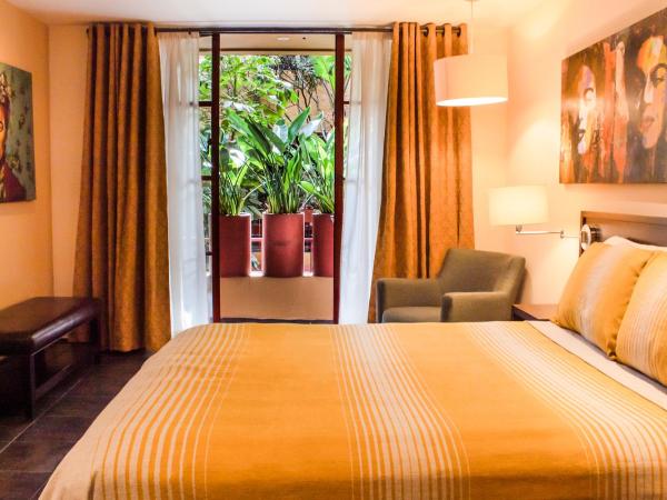 The Red Tree House : photo 8 de la chambre chambre double - vue sur jardin