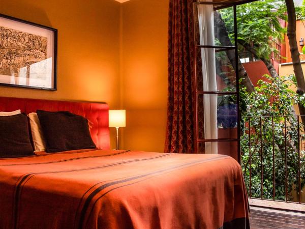 The Red Tree House : photo 1 de la chambre chambre double - vue sur jardin