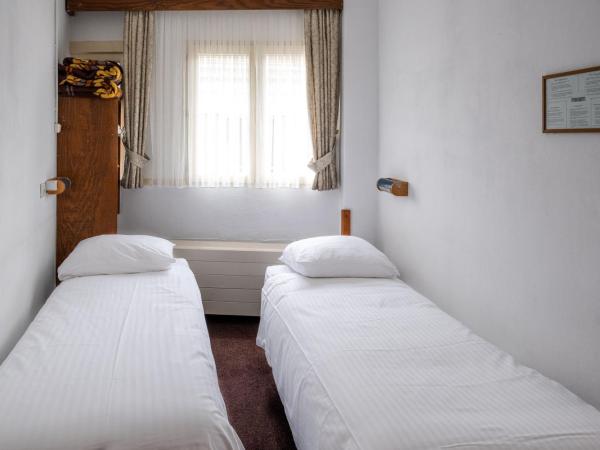 Hotel Ben Centre : photo 2 de la chambre chambre lits jumeaux avec salle de bains commune