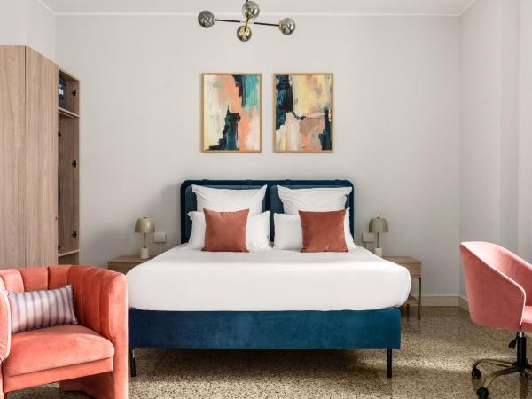 numa I Loreto Apartments : photo 1 de la chambre extra large studio with kitchen and sofa bed