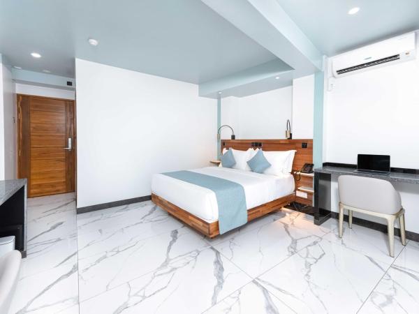 Marukab Plaza : photo 5 de la chambre deluxe double room with partial sea view (free return airport transport)