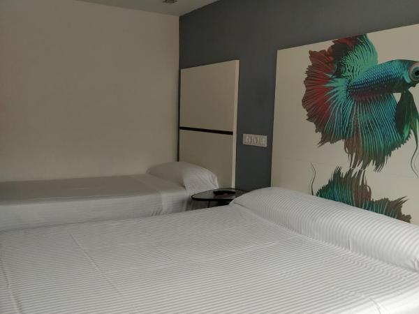 Hostal Mara : photo 2 de la chambre chambre quadruple Économique